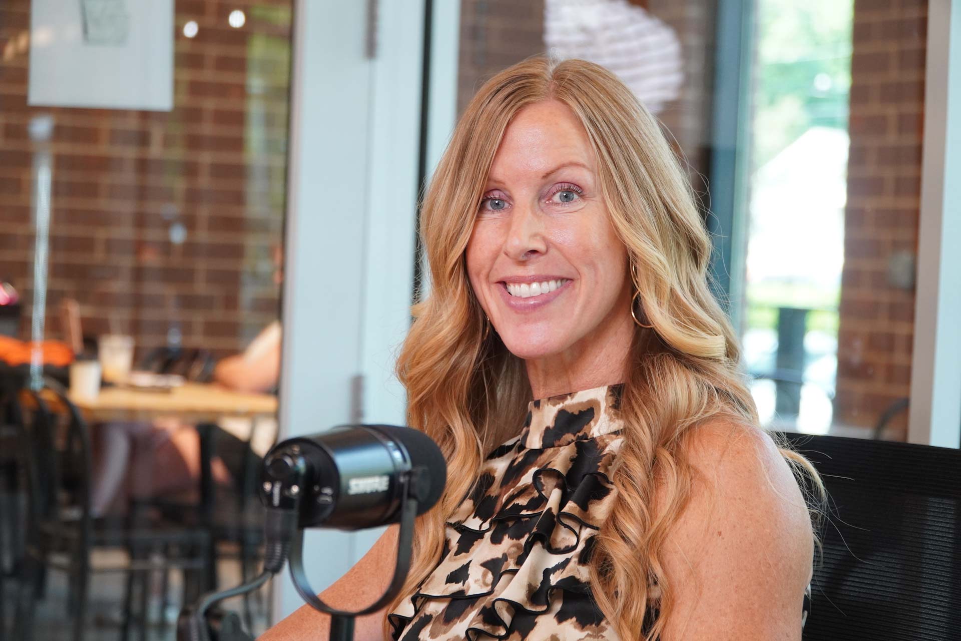 Amy Watts, life coach, serves as the moderator for the firs episode of Earn Your Seat